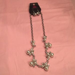 pearl necklace and matching earrings